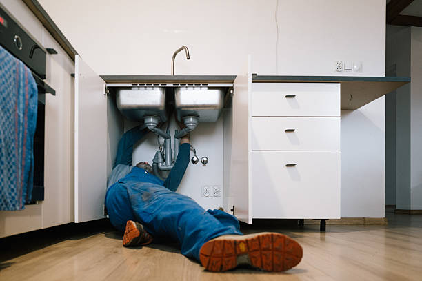 Professional Drain Cleaning technician working in Athens, OH